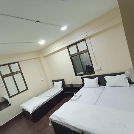 אימפאל Oyo Thangal Hotel מראה חיצוני תמונה