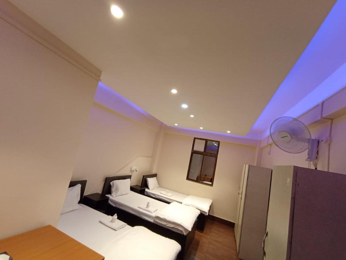 אימפאל Oyo Thangal Hotel מראה חיצוני תמונה