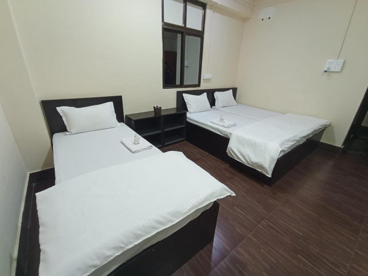 אימפאל Oyo Thangal Hotel מראה חיצוני תמונה